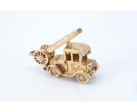 A yellow metal charm in the form of a fire engine (tests as 9 ct), late 20th Century, 3.82 g 