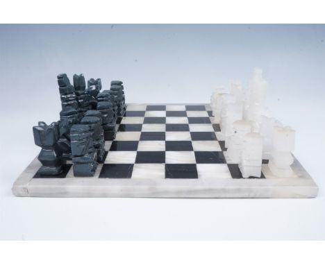 A modern marble and onyx chess set, board 35.5 cm square
