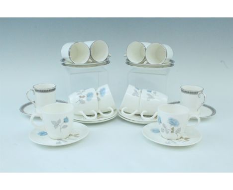 Six Royal Doulton "Ravenswood" coffee cans and saucers, together with six Wedgwood "Ice Rose" cups and saucers