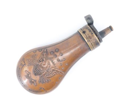 A Colt type pistol powder flask, bearing embossed American eagle decoration, 11.5 cm