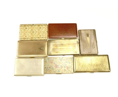 A group of vintage cigarette cases, including a faux engine turned gilt metal Emu Brand case