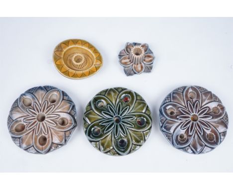 A group of Wade candle stands