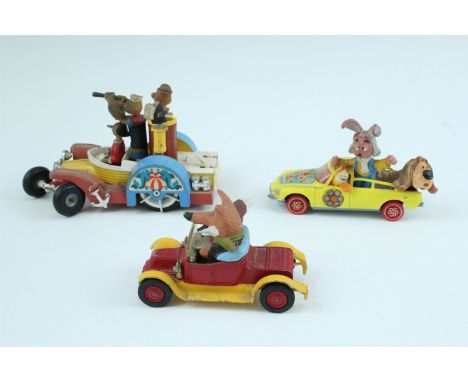 Three vintage play-worn Corgi Comics / Corgi Toys die-cast cars, comprising Popeye, The Magic Roundabout and Basil Brush