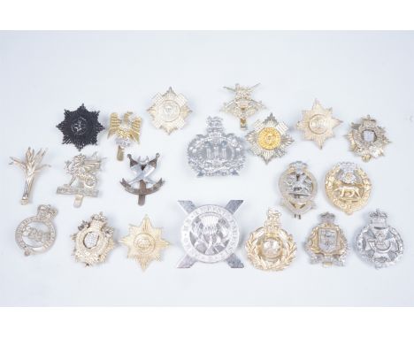 A quantity of British Army Staybrite cap badges, etc