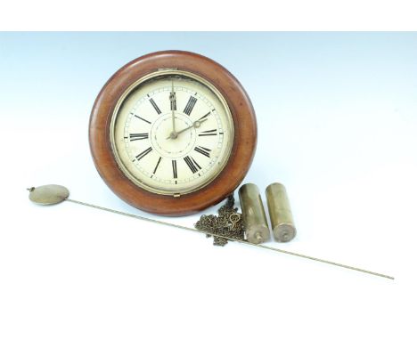 A Victorian postman's alarm clock, brass and wood movement with a gessoed and painted circular pine dial, in a circular walnu