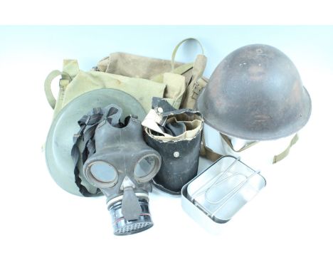 Two Second World War British army Pattern 1937 haversacks etc, together with Mk 2 and Mk 4 steel helmets, a 1945 dated set of