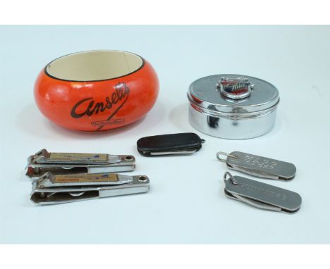 Sundry advertising items including a Ansells ceramic ashtray, a Ghia lidded pot, a Guinness bottle opener, two Concorde nail 