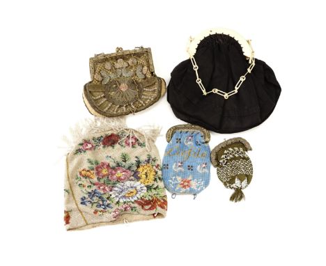 Five vintage ladies' evening bags / purses, 19th Century and later, including glass beadwork examples and a 1930s bag with Iv