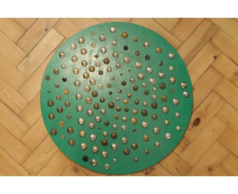 A board mounted with British army and other buttons