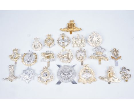 A quantity of British Army Staybrite cap badges, etc