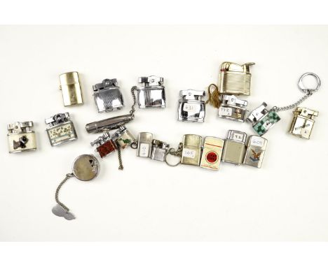 A group of vintage miniature and key chain gas cigarette lighters, including Lightson, Pacific, Orbit etc