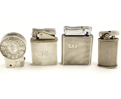 Four cigarette lighters incorporating silver elements, comprising a Colbrini "Monopol", a "Sun Lighter", a roller lighter inc