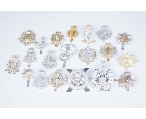 A quantity of British Army Staybrite cap badges, etc