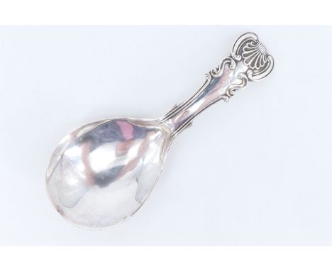 A Georgian silver caddy spoon, having a shell and scroll terminal, John Bettridge, Birmingham, 1820, 9.85 g, 9 cm