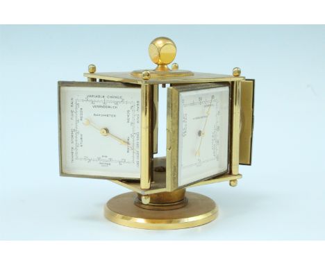 A 1960s Imhof combination clock, including a hygrometer, a barometer and a thermometer, being four hinged components in an el