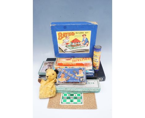 A small quantity of board and parlour games including Tiddlytennis, 'Lift-a-Stick', a Bakelite Solitaire game, etc