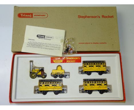 OO GAUGE MODEL RAILWAYS: A TRI-ANG HORNBY R346C Stephenson's Rocket Train Pack - comprising Rocket, 3 coaches, sealed crew pa