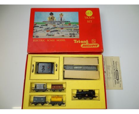 OO GAUGE MODEL RAILWAYS: A TRI-ANG RAILWAYS REX goods train set - G (minor warping to one wagon roof) in G box