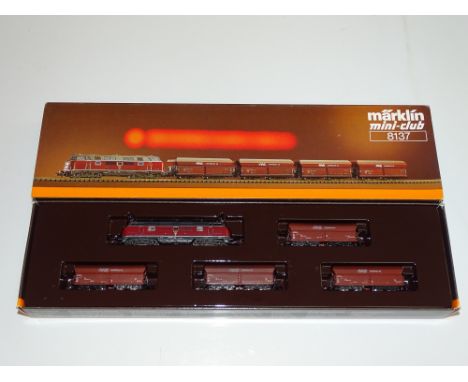 Z GAUGE MODEL RAILWAYS: A MARKLIN 8137 coal train pack comprising diesel locomotive and four hopper wagons - VG in G/VG box