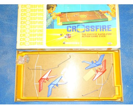 VINTAGE TOYS: A boxed CROSSFIRE game - complete with two sets of guns, bearings and puck - G/VG in F/G box