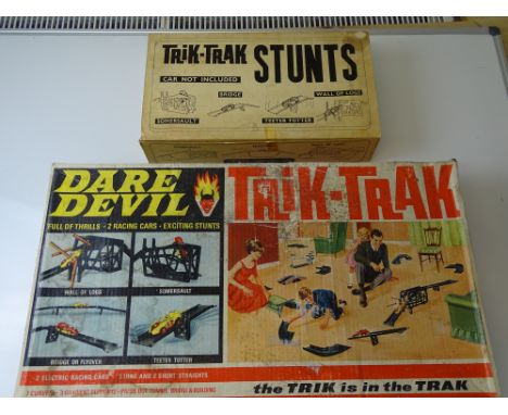 VINTAGE TOYS: A TRI-ANG Trik-Trak Daredevil set together with a Trik-Trak stunts set - G in F/G boxes (2)