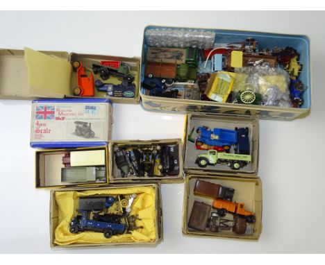 OO GAUGE MODEL RAILWAYS: A quantity of kit built 1:76 scale white metal lorries and trucks for OO Gauge railways - F/VG (unbo