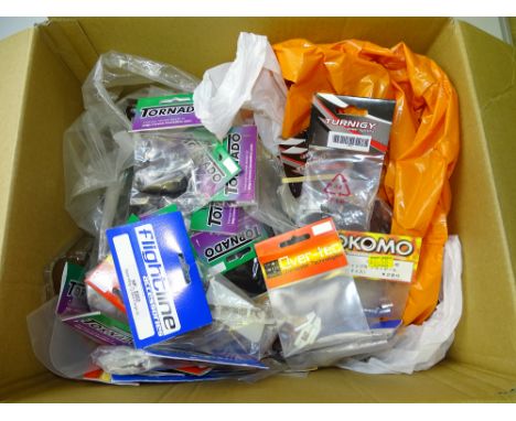 VINTAGE TOYS: A large box full of radio control spares and accessories - all in original sealed packets - VG in VG packets - 