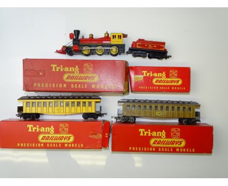 OO GAUGE MODEL RAILWAYS: A group of TRI-ANG Wild West style items to include a "Davy Crockett" loco (piece missing from cab r
