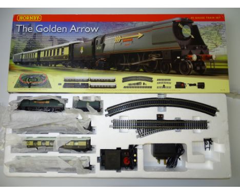 OO GAUGE MODEL RAILWAYS: A HORNBY R1119 'The Golden Arrow' Train Set with Bulleid Pacific loco 'Boscastle' and 3 Pullman coac