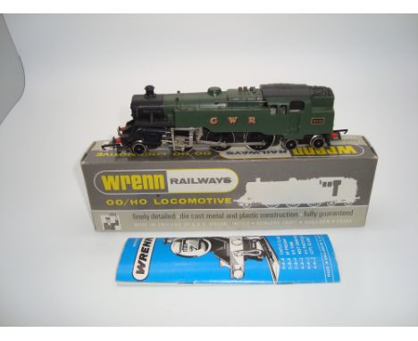 OO GAUGE MODEL RAILWAYS: A WRENN W2220 Class 4MT 2-6-4 standard tank locomotive in GWR green livery numbered 8230 - G/VG in V