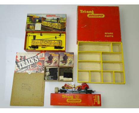 OO GAUGE MODEL RAILWAYS: A group of unusual TRI-ANG items to include a Spare Parts box (empty), an R237 Well Wagon with Bulld