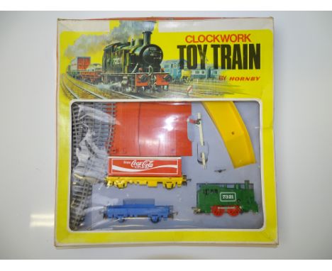 OO GAUGE MODEL RAILWAYS: A HORNBY clockwork Toy Train set - G/VG in G box