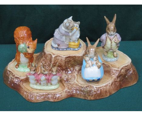 PARCEL OF FIVE BESWICK BEATRIX POTTER CERAMIC FIGURES- SQUIRREL NUTKIN, TABITHA TWITCHIT AND MISS MOPPET, MR BENJAMIN BUNNY, 