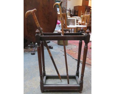 MAHOGANY STICK STAND AND TWO STICKS 