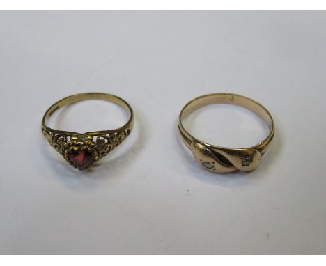 9ct GOLD CROSS OVER RING SET WITH TWO SMALL CLEAR STONES AND LADIES DRESS RING SET WITH RUBY COLOURED STONE