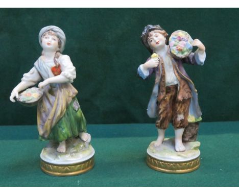 PAIR OF CONTINENTAL STYLE HANDPAINTED AND GILDED CERAMIC FIGURES 