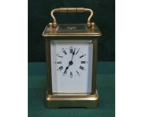 FRENCH STYLE BRASS AND GLASS CARRIAGE CLOCK 