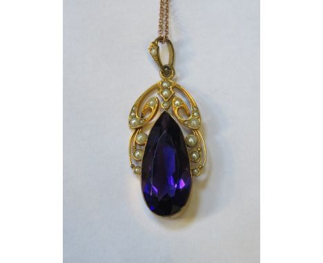 PRETTY UNHALLMARKED VICTORIAN GOLD COLOURED DROP PENDANT SET WITH AMETHYST COLOURED STONE AND PEARL TYPE STONES ON 9ct GOLD C