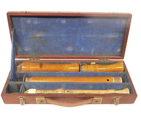 An antique recorder in wooden case by Johannes Adler and another example by Schotts.