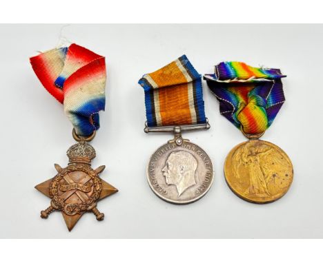 WW1 Trio of Medals, WW1 1914-15 Star, War and Victory medals awarded to 20682 Private Arthur Cotton of the Manchester Regimen