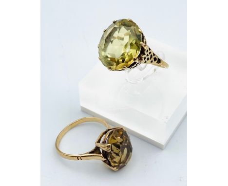 Two 9ct gem set dress rings, claw set citrine and topaz, 0ne with pierced gallery and other double claw set Sizes - N/O Weigh
