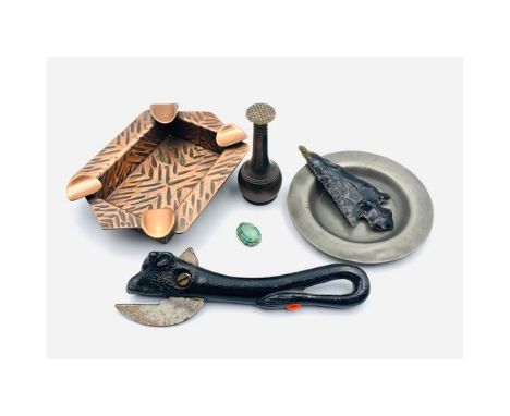 Collection of odds to include an Art Deco brass ashtray. 13cmCast Iron Bull can opener. 15cmSmall pewter dish. 10cmFlint spea