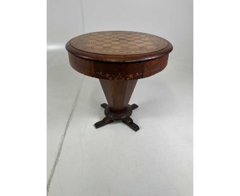 A trumpet sewing table, height 44 cm, diameter 47cm, incorporating a chessboard inlaid on top.