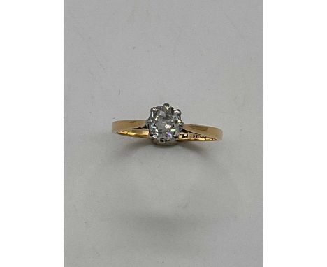 An 18ct yellow gold diamond solitaire ring, the cushion cut stone approx 0.5ct, size M 1/2, approx 2g.