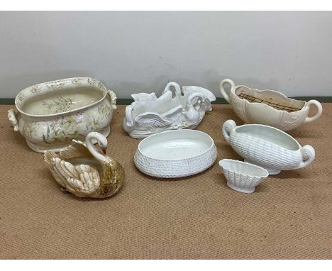 A quantity of decorative ceramic planters including Brannam Pottery, Arthur Wood and other potteries.