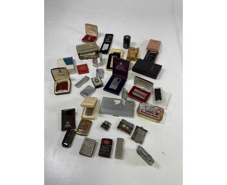 A group of vintage lighters including a 1950s Sankyo 'Price Newsletter Musical Lighter', various other lighters etc.