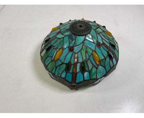A Tiffany style glass lamp shade.