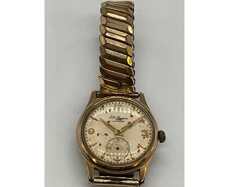 J. W. BENSON; a vintage 9ct gold gentleman's wristwatch with 15 jewel movement and case numbered 46921, diameter 32mm.