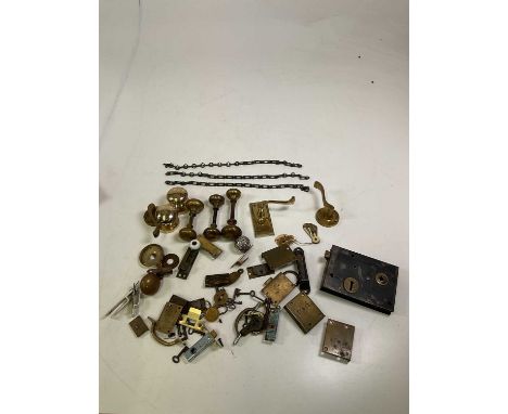 A collection of vintage door knobs and fittings.