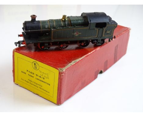 OO SCALE MODEL RAILWAYS: A TRIX TWIN F103 Class 56xx steam tank locomotive in BR green livery numbered 6664 - G in G box